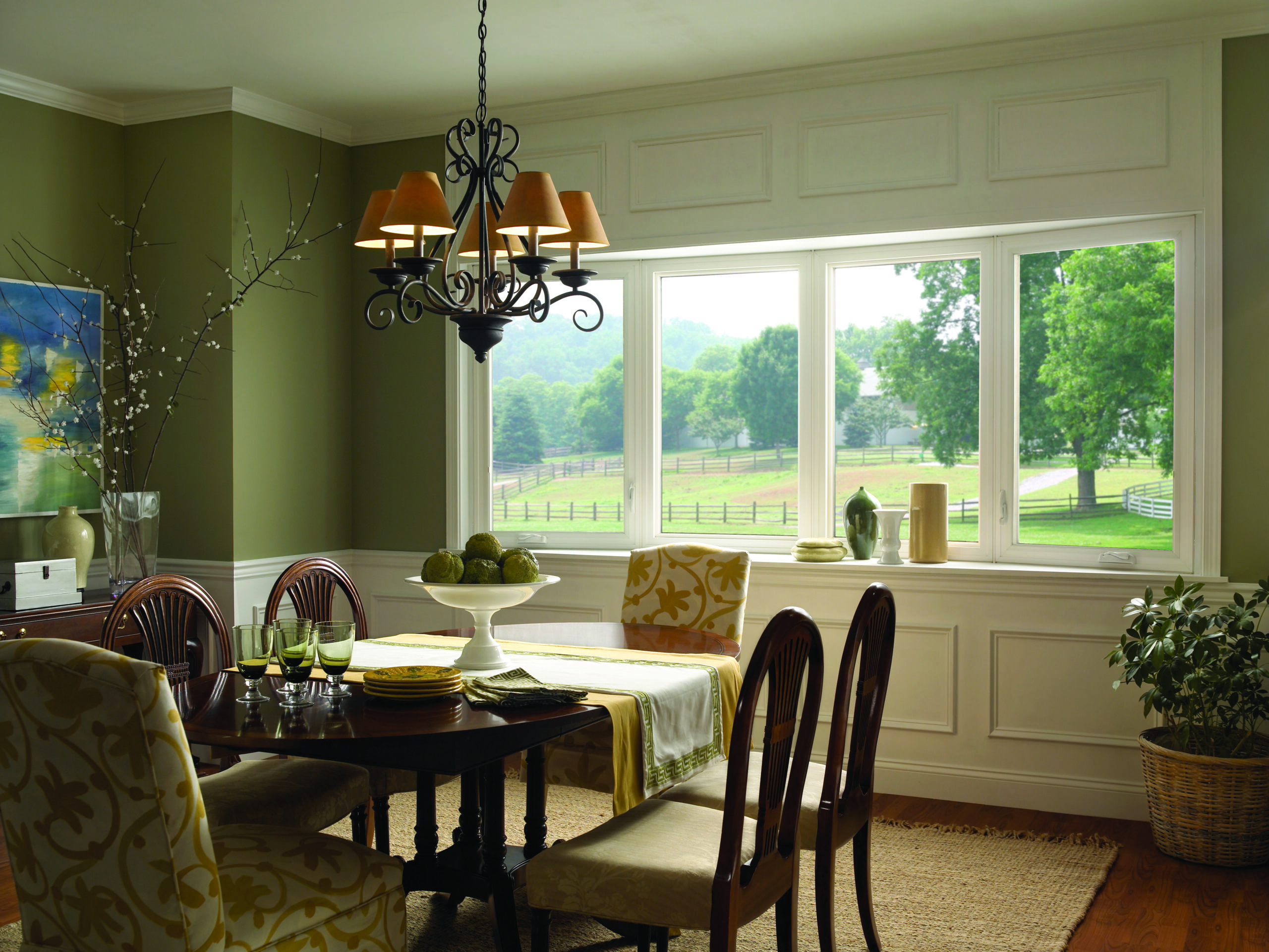 Bow Window Illuminating a Dining Room with Natural Lighting